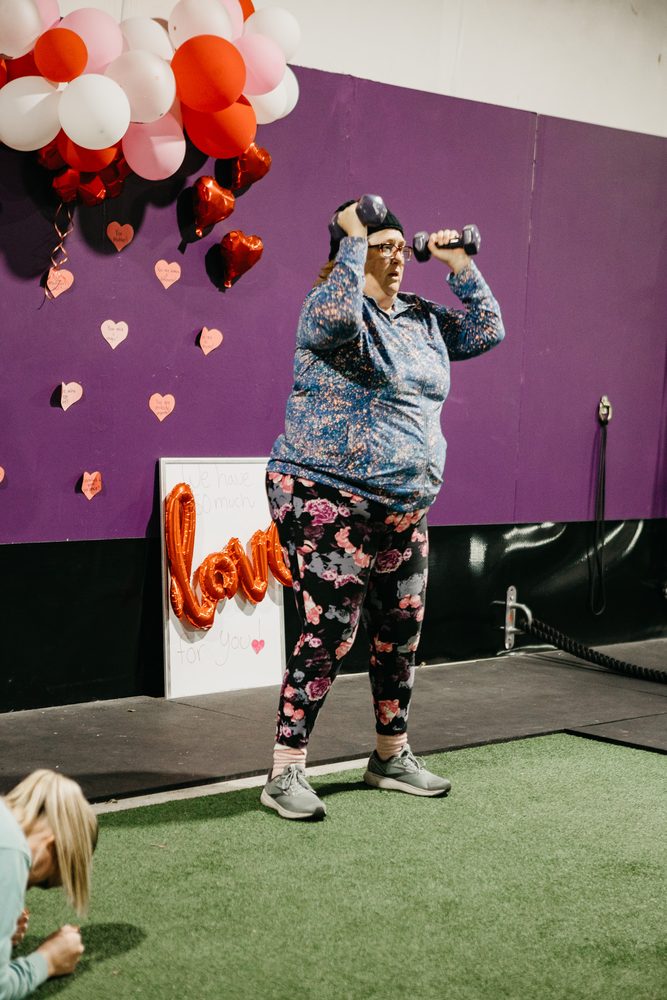 A member training with a kettlebell